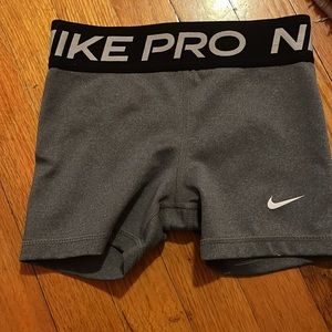 2 kids nike pros gray and black